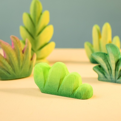 Lake Bush among other wooden toy plants.