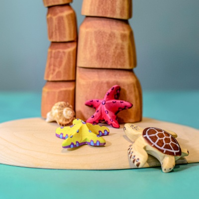 Yellow Starfish Set as a delightful addition to a beach-themed room decor