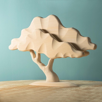 The Japanese Maple NAKED toy, presenting the fine grain and organic texture of wood in its purest form.