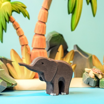 Wooden Bimbi Elephant Small from BumbuToys, a pocket-sized pachyderm with a heart of gold