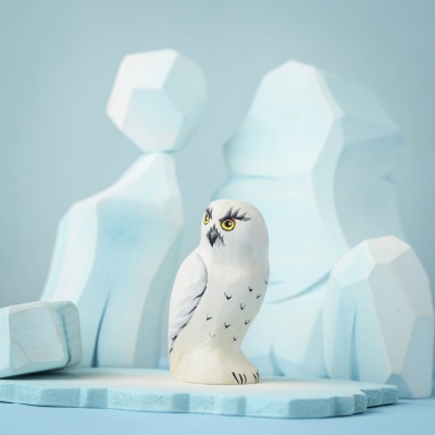 Snowy Owl wooden toy in an Arctic-themed play scene with icy blue blocks.