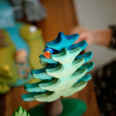 Artisanal craftsmanship shines in BumbuToys' Large Green Spruce, inspiring stories of the great outdoors.