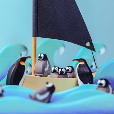 The Penguin Chick, a delicate wooden creation by BumbuToys, fostering empathy and knowledge about penguins.