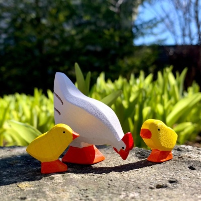 BumbuToys Wooden Chicks with a toy rooster or hen for a complete farm family.