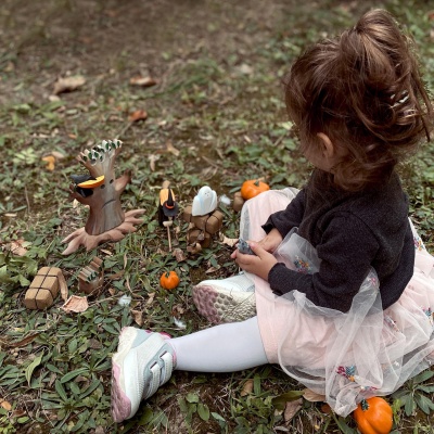 Kid with Wooden Toys