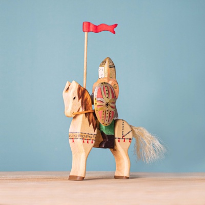 Handcrafted wooden Dacian Knight with sword and shield, mounted on a strong wooden horse.