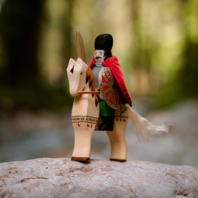Michael the Brave and steed arranged in a play scene, potentially with other historical figures or landscape elements.
