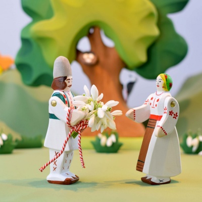 The Peasant toy with a playful, mischievous grin.