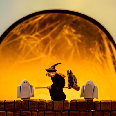 Non-toxic painted witch toy by BumbuToys, flying into imaginative play