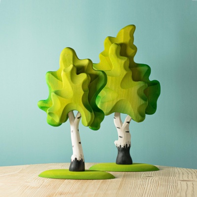 BumbuToys' 2 Green Birch Trees SET, showcasing vibrant hand-painted foliage on intricately designed trunks.