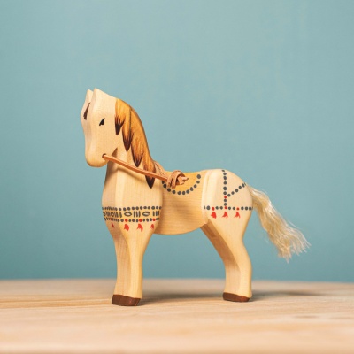Close-up image of the Steed's hand-carved features and smooth finish.