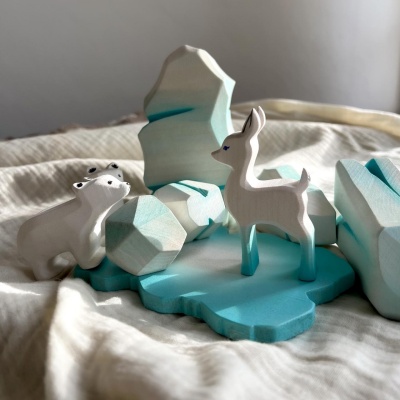 A magical wooden friend, the White Blue Fawn from BumbuToys invites endless adventures