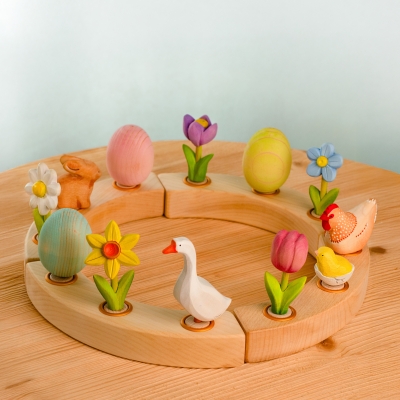Spring Waldorf celebration ring with blue forget-me-not eggs goose and bunnies