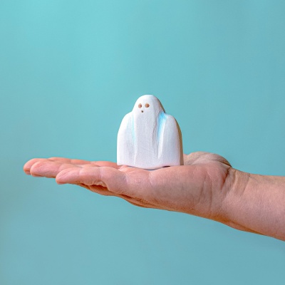 Child engaging with the eco-friendly Ghost toy for imaginative fun