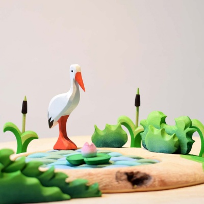 Lifelike green shrub wood figure, enhancing any botanical collection.