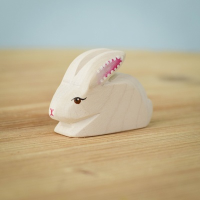 Perching Easter Rabbit - a handcrafted wooden bunny with a delicate natural finish.
