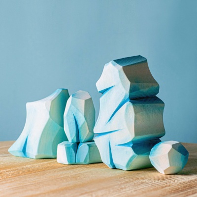 Bumbu Toys' "Icy Rocks" set, hand-painted in cool blues and whites.