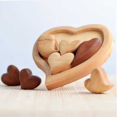 The Hearts Puzzle incorporated into a Valentine's Day-themed play scene with other toys.