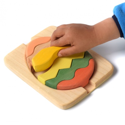 This Egg Puzzle by BumbuToys, an engaging wooden toy that encourages creativity and pattern recognition.