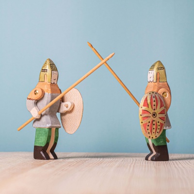 Child playing with the Dacian Knight, Spear, Shield and Dragon SET, creating a make-believe scene.