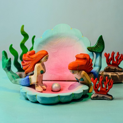 Shell and Mermaid set in a storytelling setup, sparking children's imagination