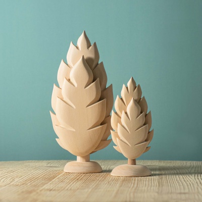 Handcrafted naked thuja tree figure, celebrating organic beauty.