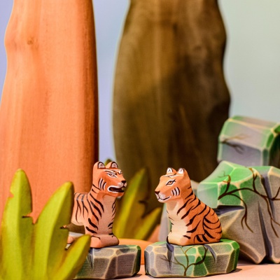 BumbuToys' commitment to sustainable play, tiger cub sitting