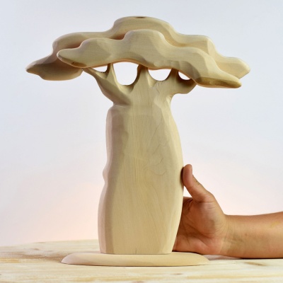 The Baobab Thick Trunk NAKED, a BumbuToys creation, offering an unpainted canvas to celebrate the beauty of the African savannah.