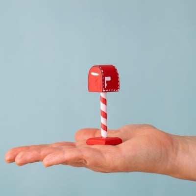 Santa’s Mailbox held in hand for size reference.