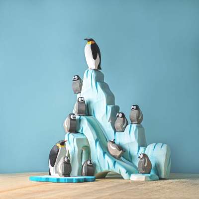 Artisanal Icy Cliffs and Penguin Family wooden set, a BumbuToys creation for imaginative play.