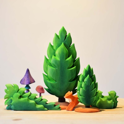 Handcrafted wooden thuja, painted in shades of green for a realistic look.