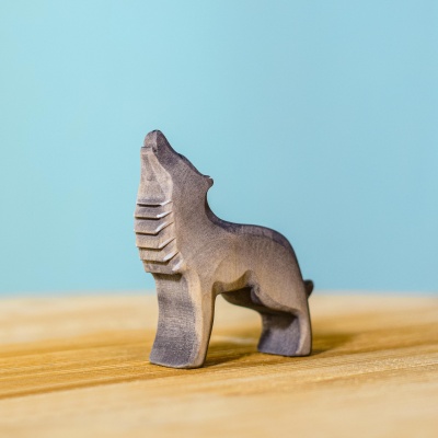 Artisanal Wolf Howling wooden toy by Bumbu Toys depicting a natural call