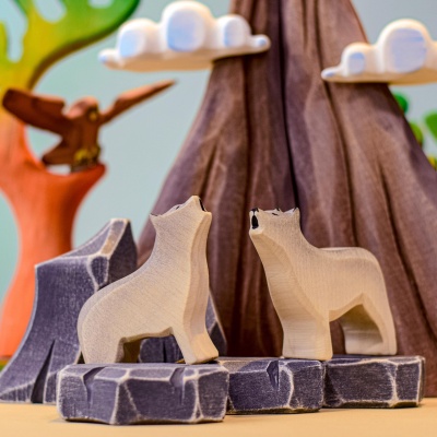 Howling Wolf displayed amidst other handcrafted wooden objects.
