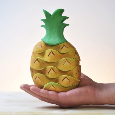 BumbuToys presents the Pineapple, a tropical delight in wooden form, perfect for interactive education.