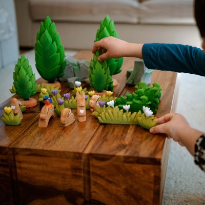 A serene Sitting Rabbit wooden toy, inviting a connection with the calming spirit of nature.