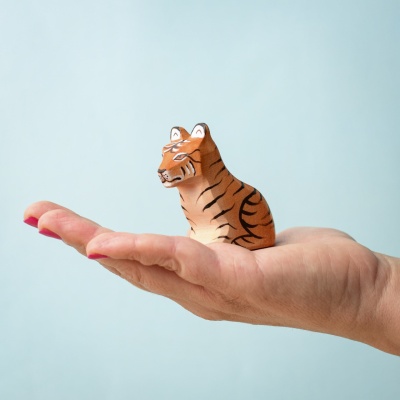 Sustainable wooden tiger cub in sitting pose, BumbuToys