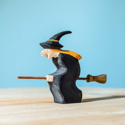 Magical wooden Witch toy from BumbuToys' fantasy series, in black robe
