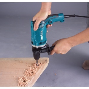 Masina de gaurit cu percutie Makita 710W, 13 mm, livrata cu mandarina rapida - Img 2
