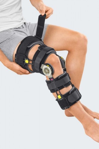 Orteză de genunchi universală cu limitare flexie extensie
