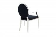 MODERN BAROCK fauteuil combineert symbiose van roestvrij staal en hoogwaardig zwart fluweel met knopen
