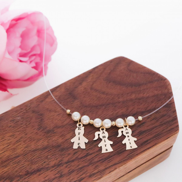 Colier invizibil cu fir transparent, perle, bilute si figurine copilasi din aur 14k 585