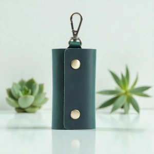 Port Chei Nino Verde Cu Accesoriu Metalic