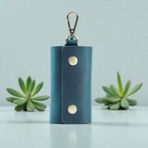 Port Chei Nino Albastru Cu Accesoriu Metalic