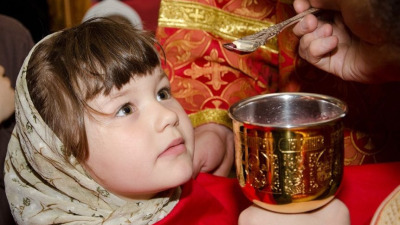 Sindromul Down şi debilitatea mintală la copii vindecate printr-o deasă împărtăşire cu Sfintele Taine