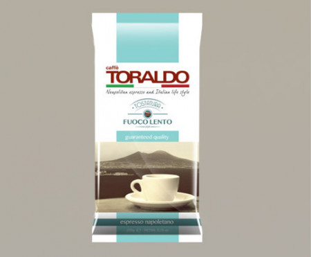 Macinato e Tostato a fuoco lento. Caffè Toraldo