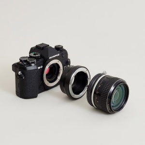 Urth ULMA-F-M43, Adaptor Obiectiv montura Nikon F la camere Micro Four Thirds (MFT)
