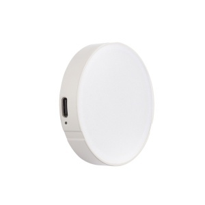 Lampa compacta magnetica Godox LR15Bi fixata pe spatele telefonului