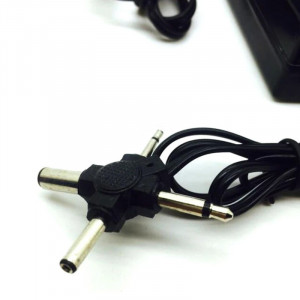 Alimentator universal reglabil 3v-12v, ac 220v, dc 1200 mah, 4 mufe - Img 5