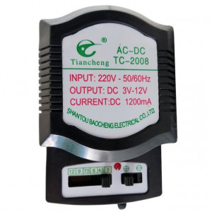 Alimentator universal reglabil 3v-12v, ac 220v, dc 1200 mah, 4 mufe - Img 3