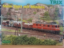 Minitrix 11454 Zwitserse startset met E-lok, 4 goederenwagens, ovaal met twee , trafo